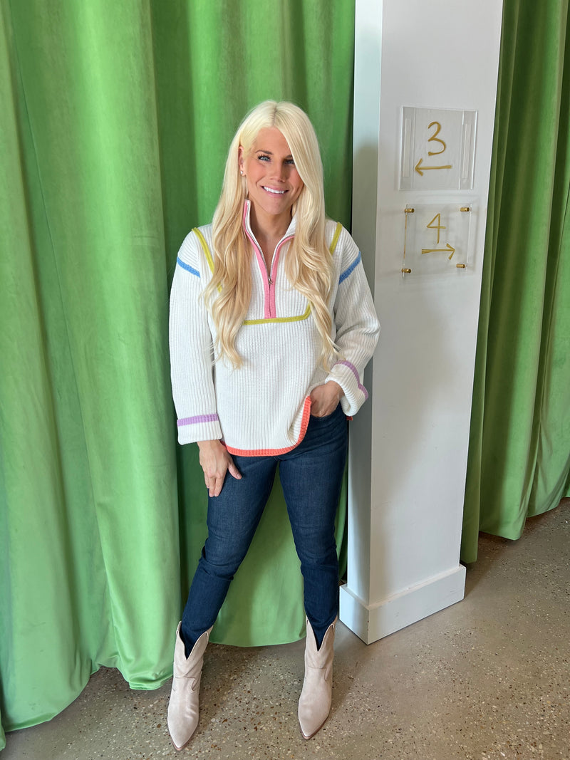 White Multi-Stripe Sweater with Multi-Colored Piping and 1/2 Zip Pullover Style - A stylish and comfortable winter sweater featuring eye-catching details, perfect for staying cozy and on-trend.