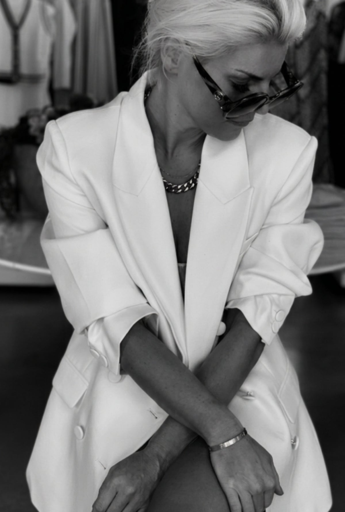 Brittany in a white oversized blazer
