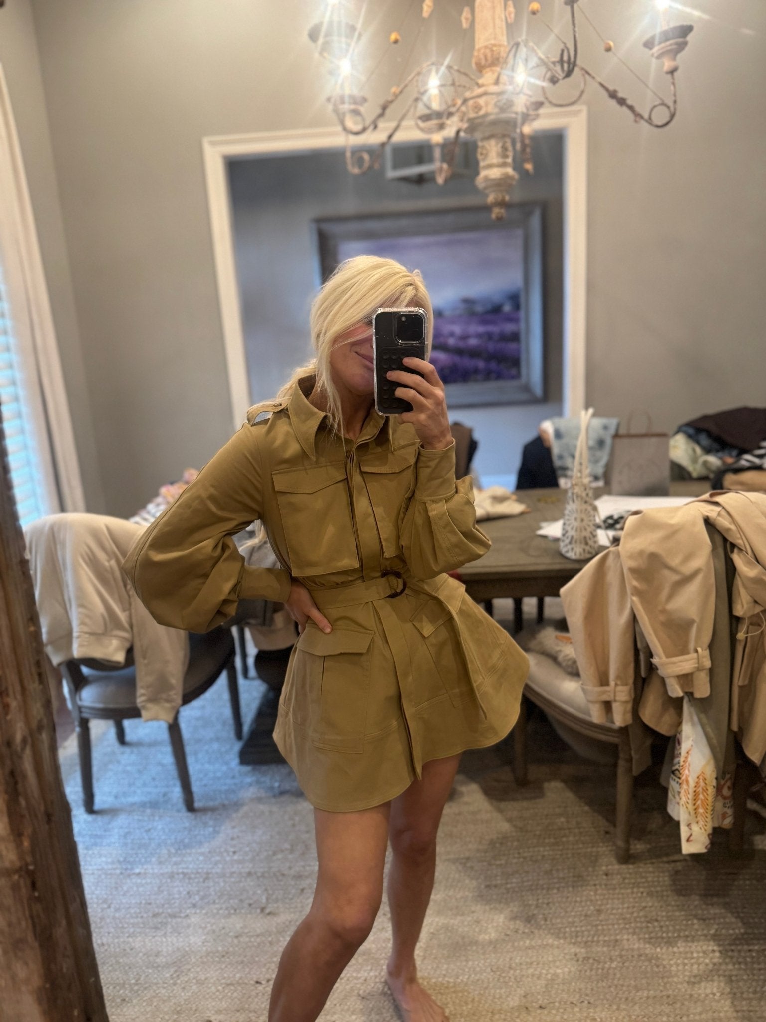 mini dress with trench coat Style Tip: Blame it on the shape, or maybe its the timeless appeal of a trench coat, and ah, this classy the mini dress and boots combination always feels reminiscent of the '